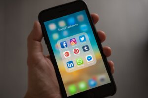 Phone screen showing social platforms