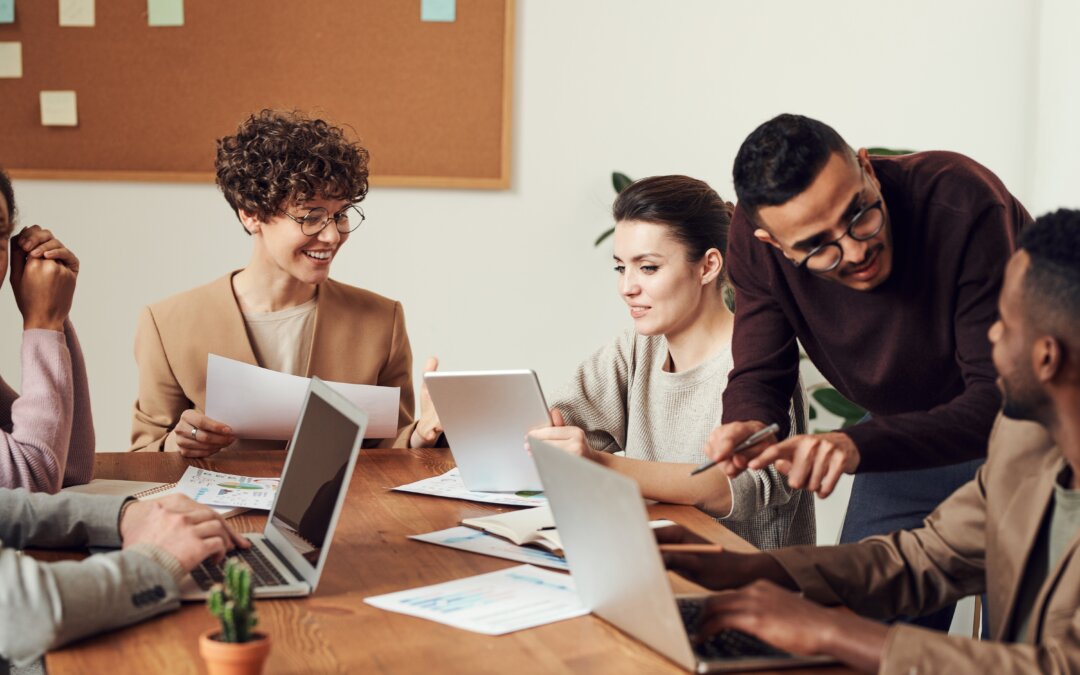 A group of people working around a table